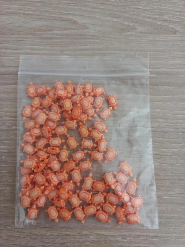 Set of orange acrylic beads “Turtle”